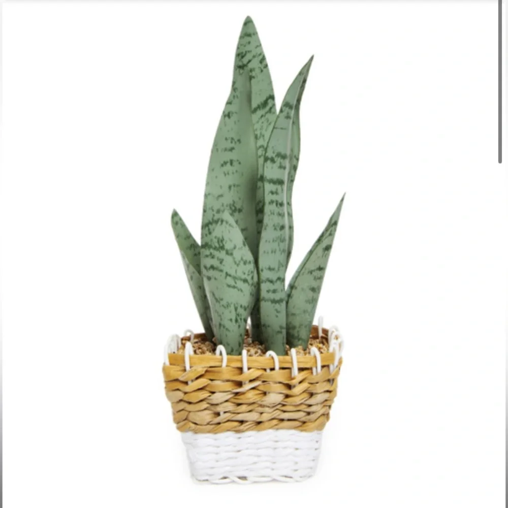 Faux snake plant with woven basket planter